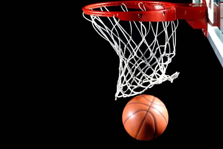 a basketball going through the hoop